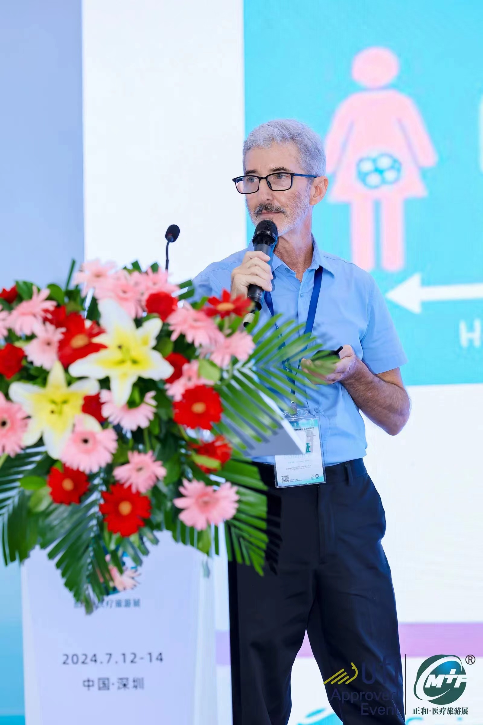 Dr. Ramsey speaking at 2024 Shenzhen Medical Tourism Expo